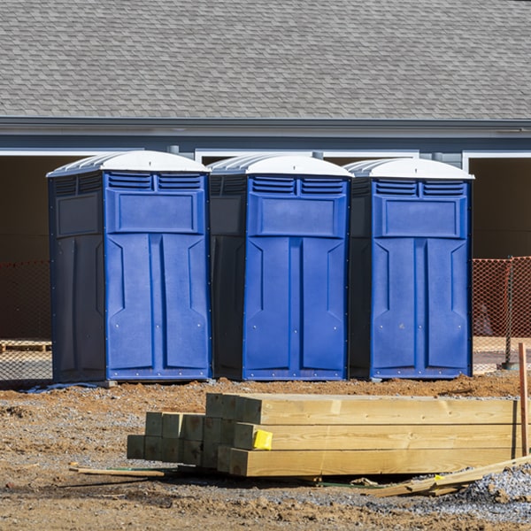 what is the cost difference between standard and deluxe portable toilet rentals in Velarde NM